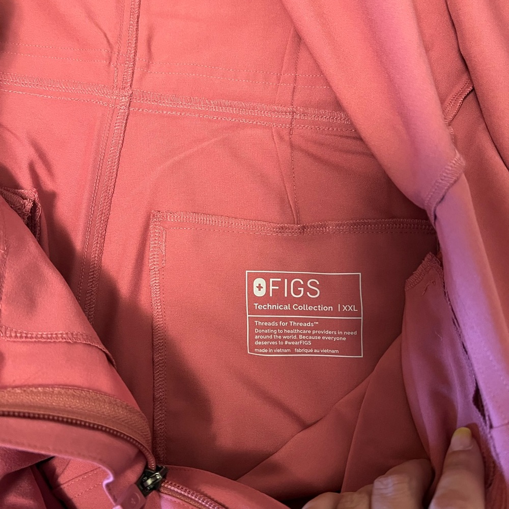 New never worn. Limited edition breast cancer Quartz Figs Jumpsuit.